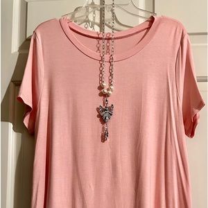 Panhandle brand; coral-colored tunic; size medium